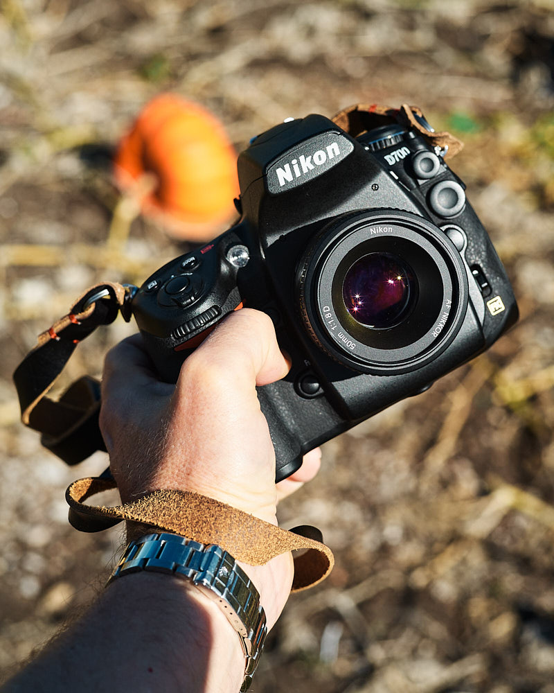 Nikon D700 with 50mm f1.8 AF-D lens and Hawkesmill Kensington leather camera neck strap.